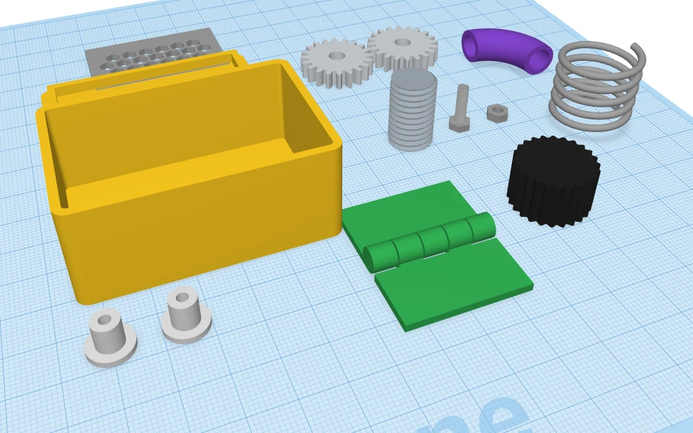Parametric parts on the workplane: a yellow project box, PCB standoffs, two meshing spur gears, a threaded rod, bolt and nut, a green hinge, a black knurled knob, a spring and a purple pipe elbow.