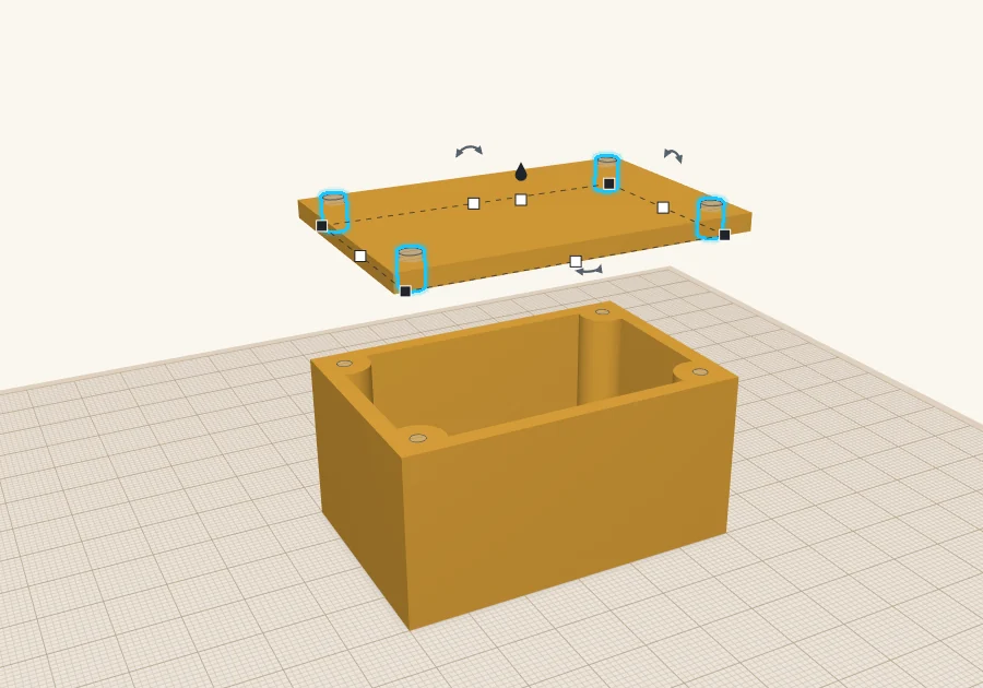 The lid lifted straight above the box, with four 3.4 mm holes through it, lined up over the posts below.