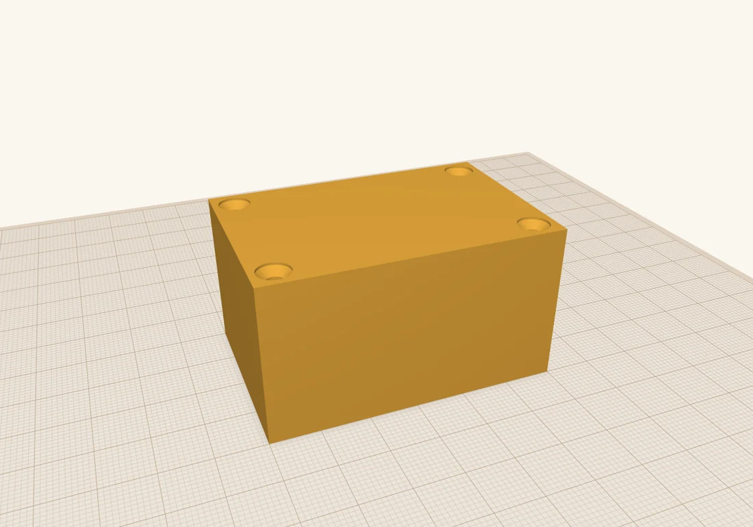 The closed project box in ScottiCAD, with the four countersunk holes visible in its lid.
